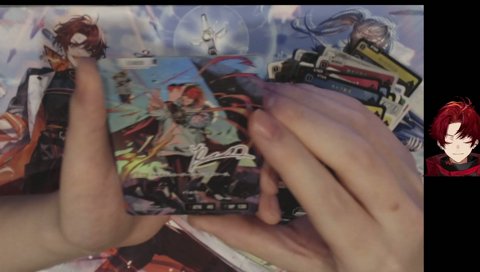 rionのサインカードで汗を拭くツルギ